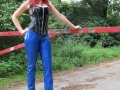 redhead in latex pants walking on public road in high heels
