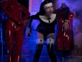 bizarre latex fetish zombie nun walking among rubber dummys in high heels